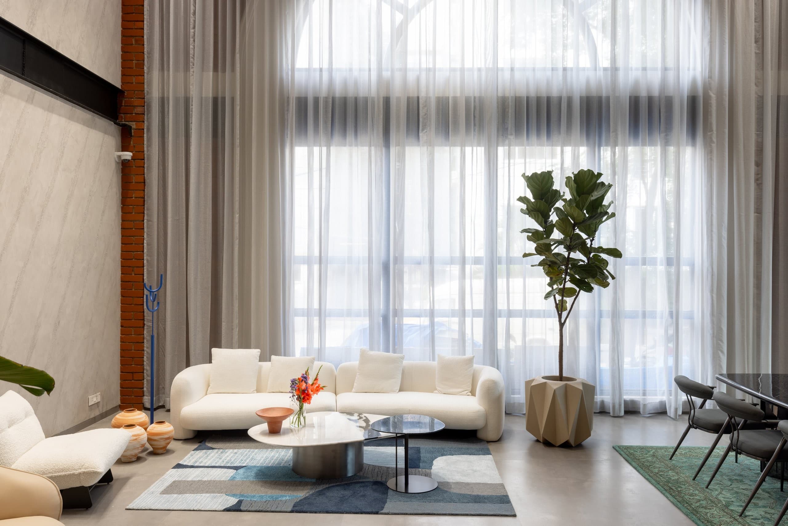 A showroom arranged as rooms, not rows.